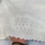 White Chikankari cotton cutwork fabric with floral embroidery
