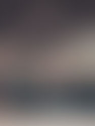 Stressed woman with glasses holding her head while multiple people point fingers at her, illustrating workplace overwhelm and the importance of setting boundaries at work.