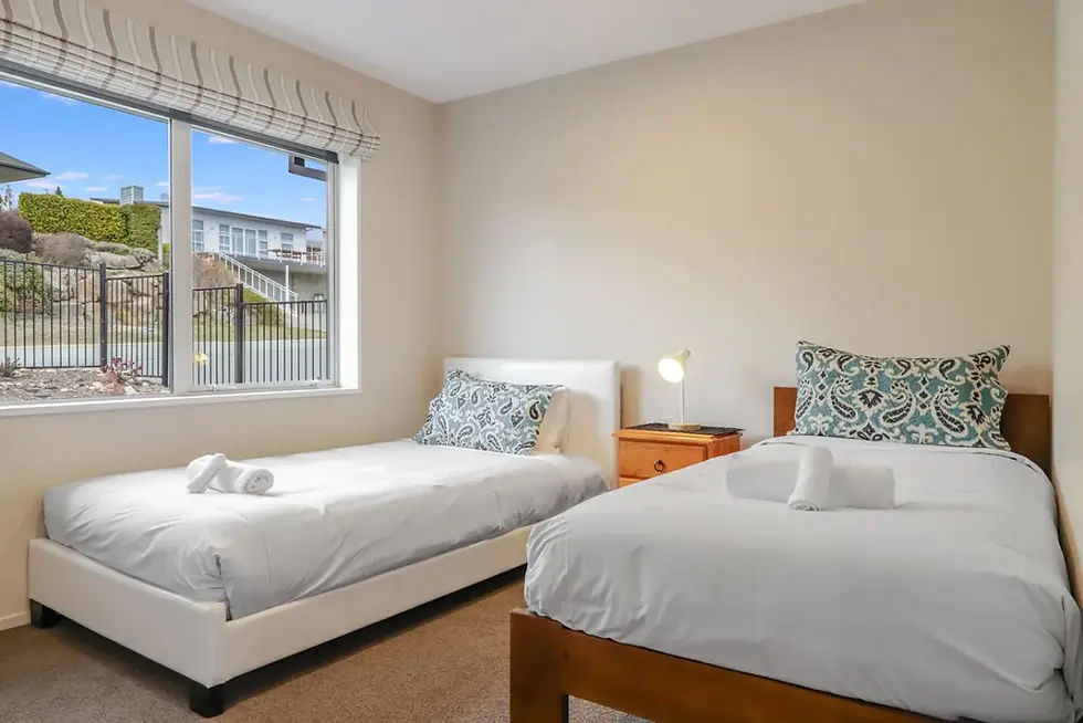 Twin bedroom with two single beds at The Star Yard, Lake Tekapo