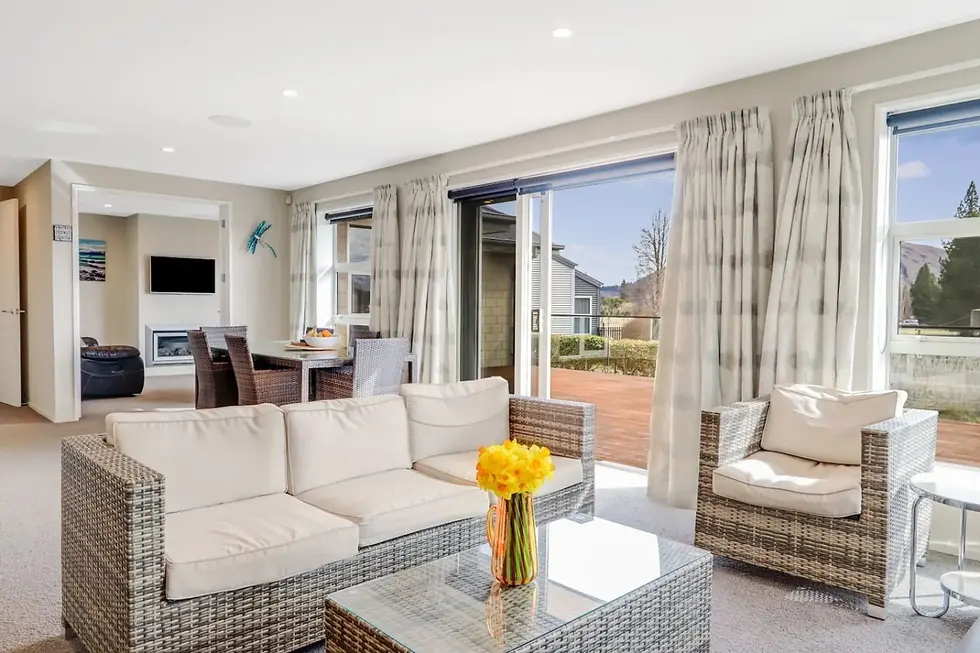 Sunny living room opening to the deck at The Star Yard, Lake Tekapo