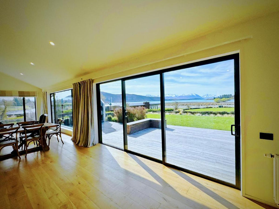 Living area opening to the deck with lake views at Cedar Lakeview, Lake Tekapo