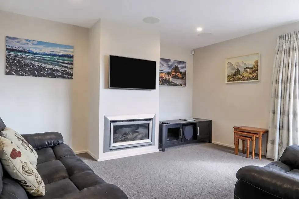 Lounge with fireplace at The Star Yard, Lake Tekapo