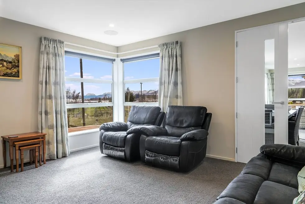 Separate TV lounge with leather sofas at The Star Yard, Lake Tekapo
