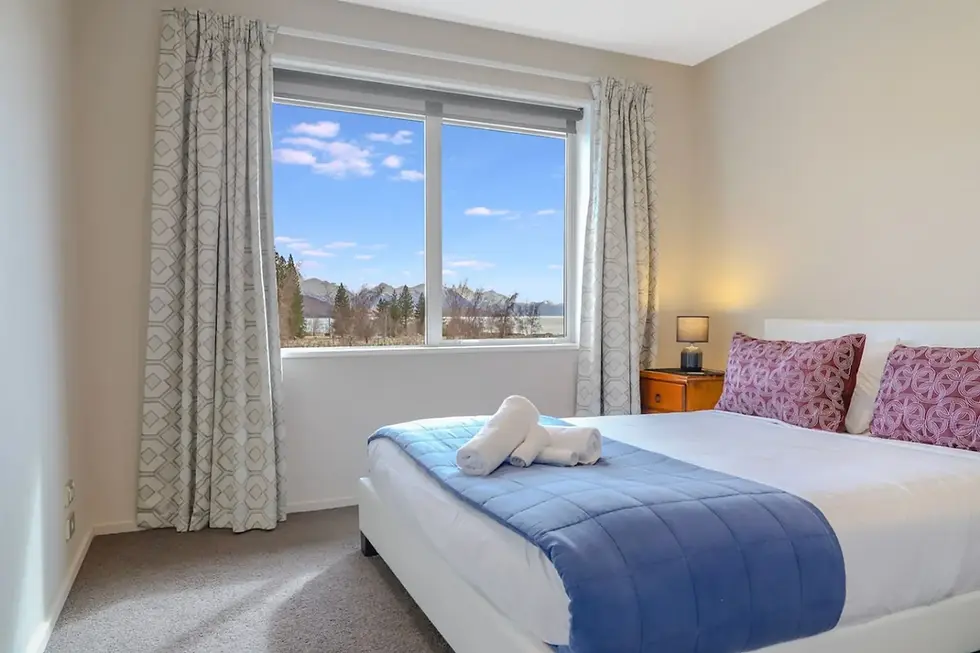 Queen bedroom with lake and mountain views at The Star Yard, Lake Tekapo