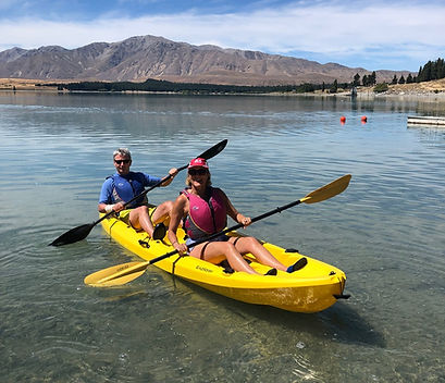 two people in a double kayak