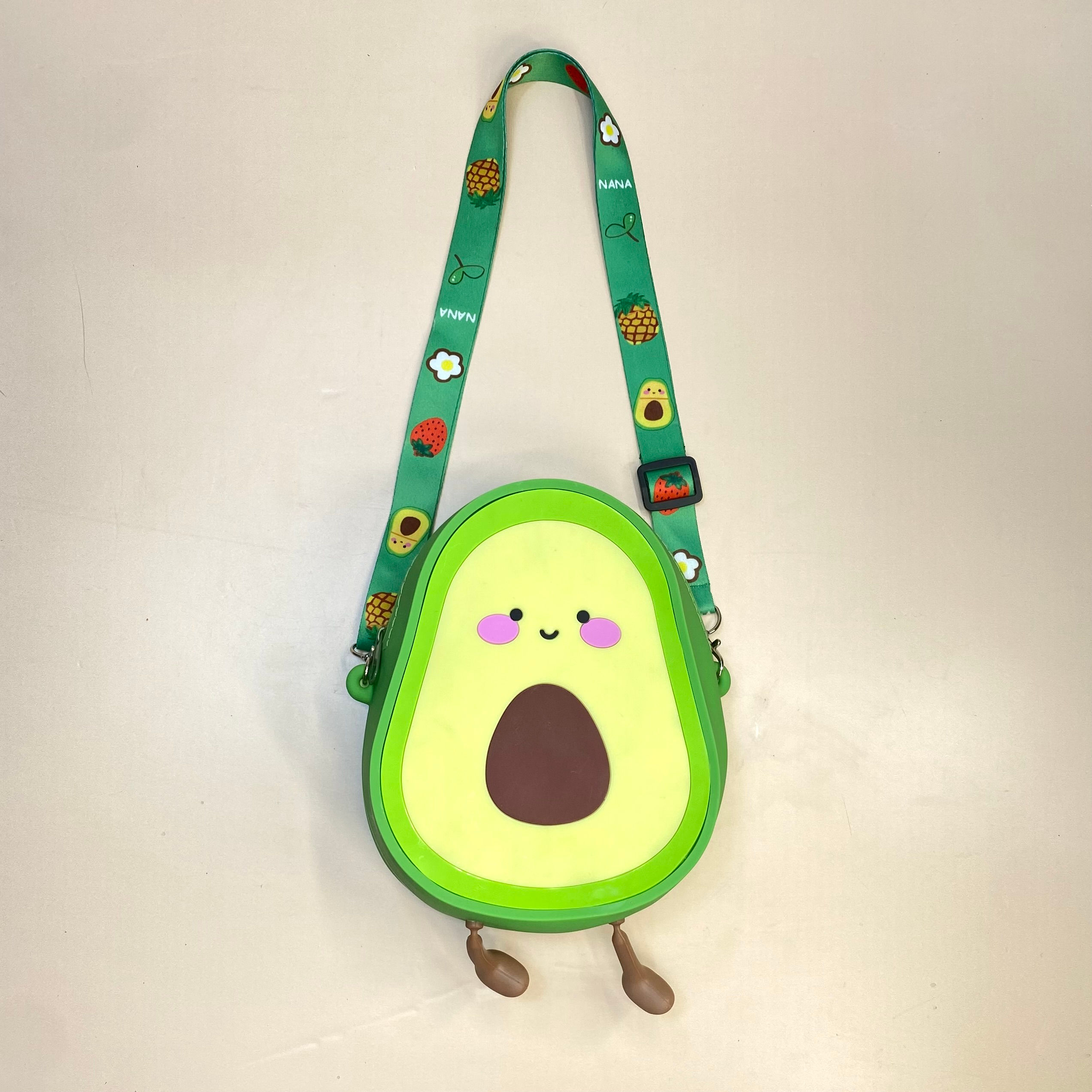 CARTERA CON FORMA DE MEDIO AGUACATE