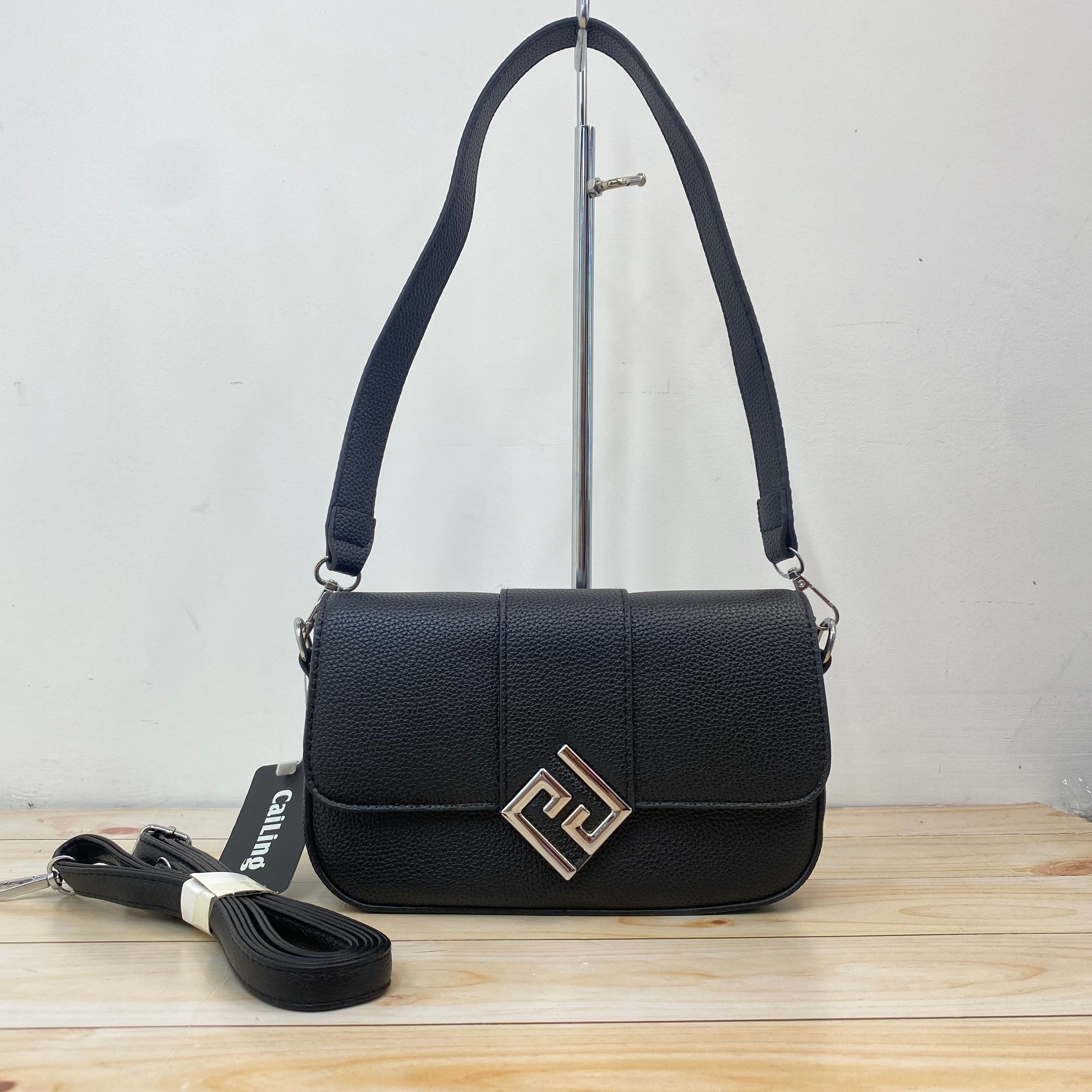 CARTERA CON EVILLA CRUZADA