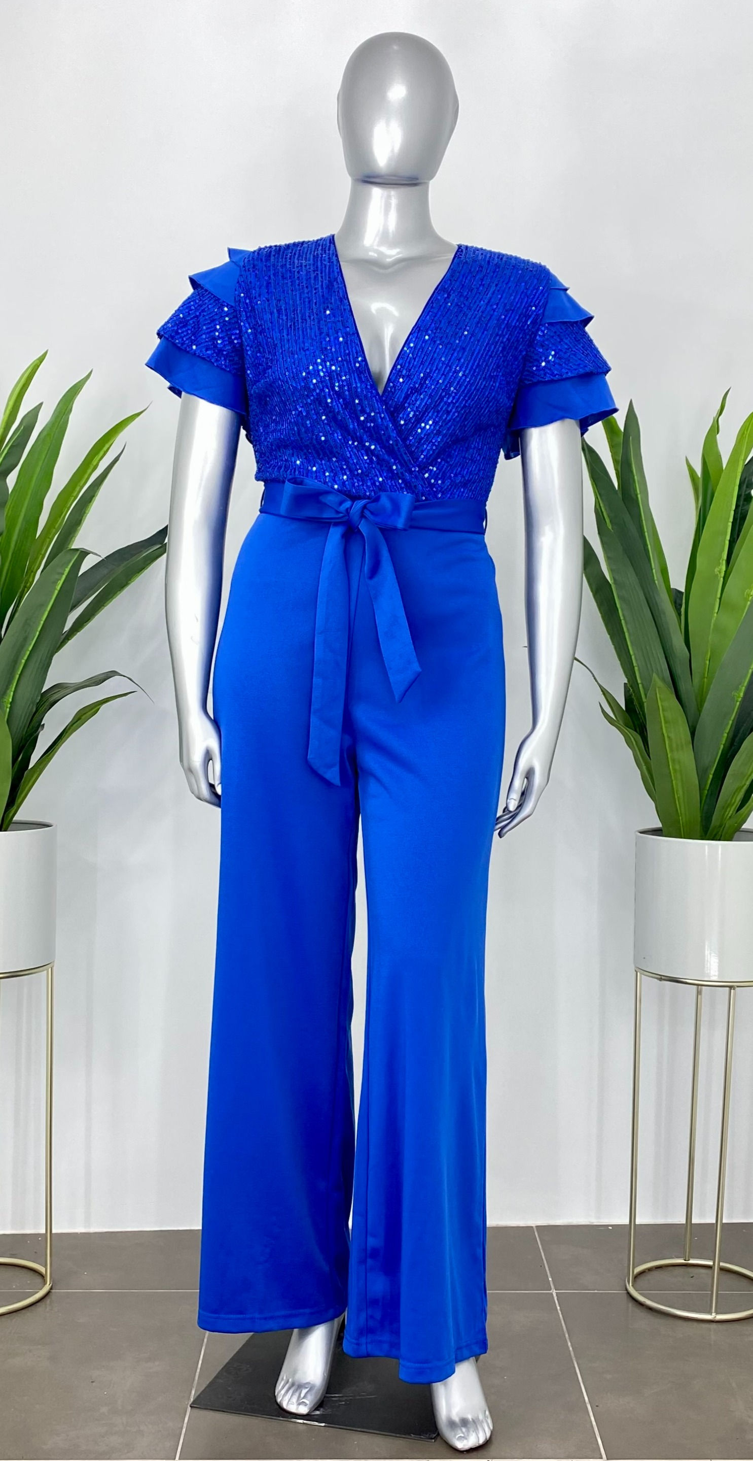 JUMPER CON LENTEJUELAS Y CAPAS EN LAS MANGAS