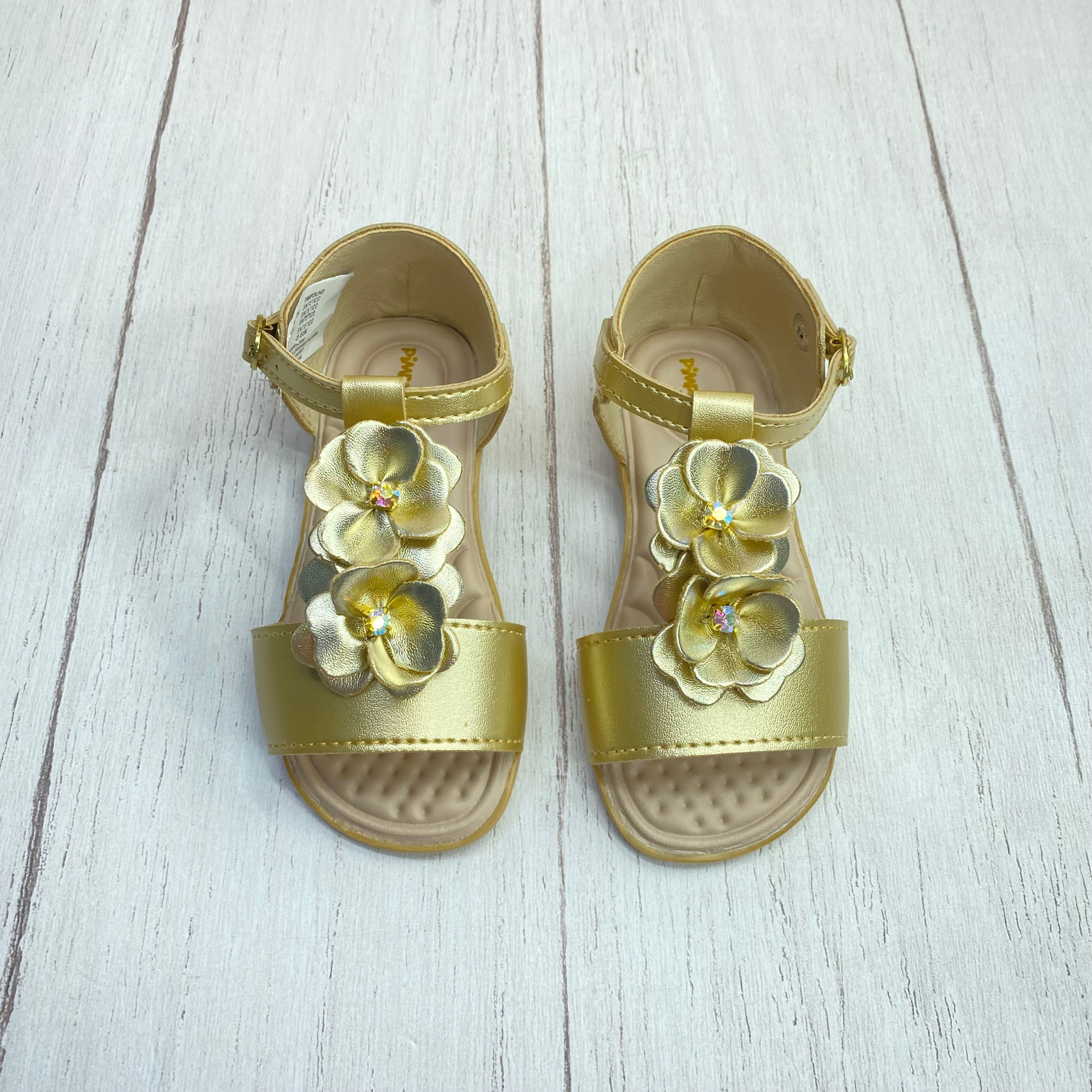 SANDALIAS DORADAS CON FLORES METALIZADAS