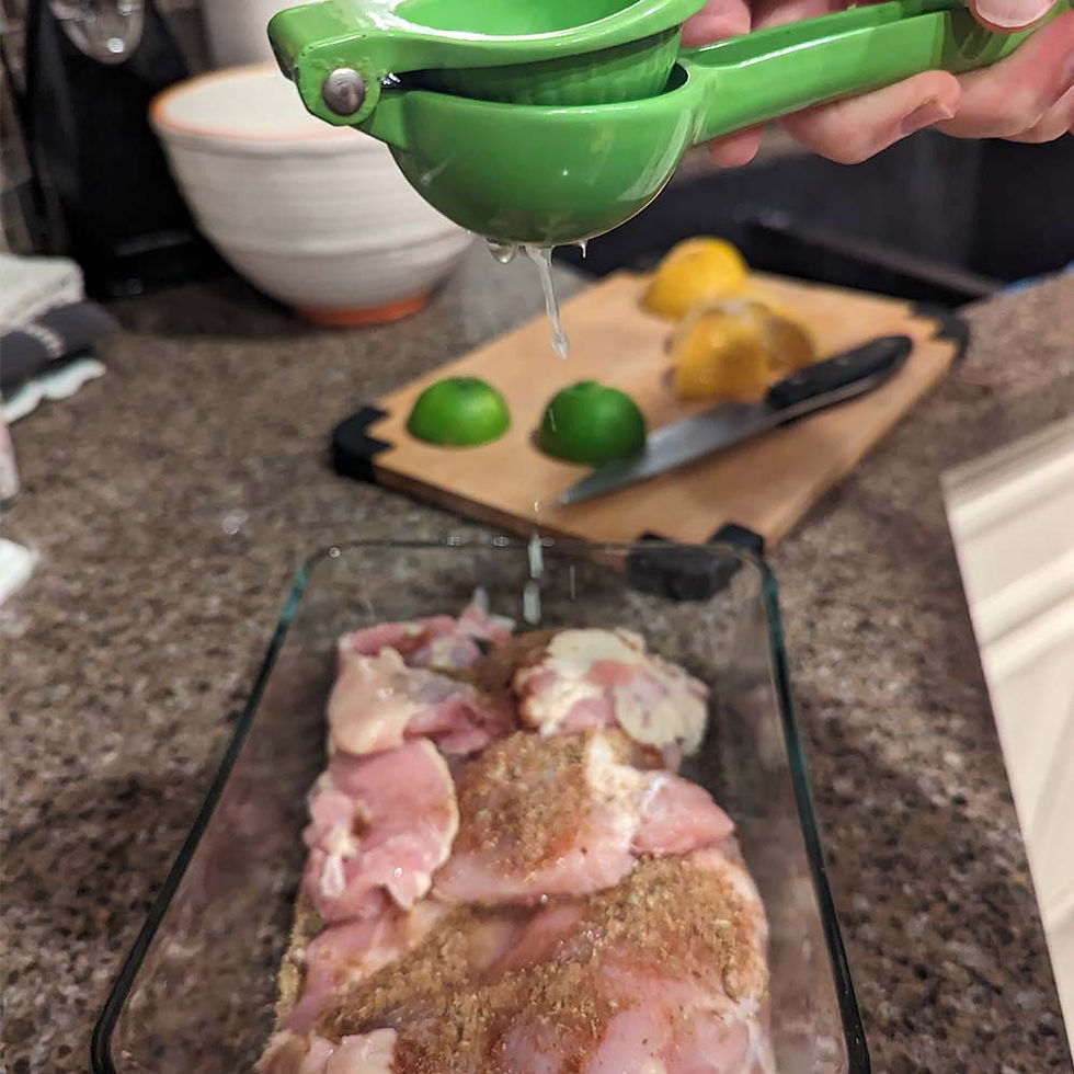 Squeezing lime over fajita chicken