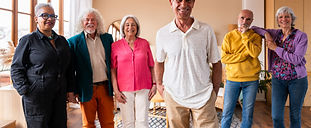 group-of-senior-friends-bonding-at-home-for-dinner-2024-08-28-22-20-04-utc.jpg