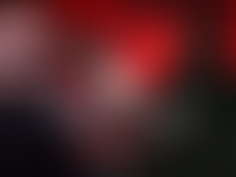 Kurtis Mercer speaking intensely into a microphone wearing sunglasses and a black shirt with white patterned sleeves, with bold text reading “FINE OR NUMB?” beside the dark silhouette of a seated man against a deep red background — symbolizing hidden pain, emotional numbness, and the struggle men face beneath the surface.