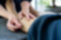 Laura Foster practising acupuncture on a patient.