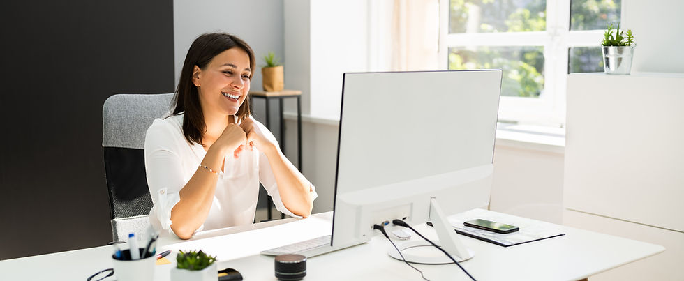 Business owner using virtual accounting software at desk
