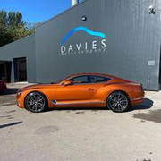Orange sports car from the side