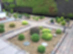 Landscaped garden with lots of paving.jpg