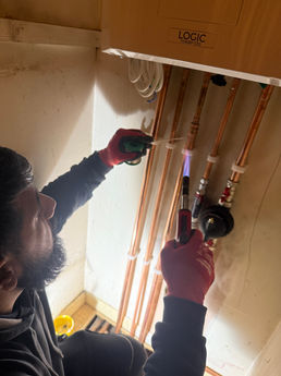 Engineer working on pipes