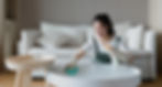 Woman cleaning a table