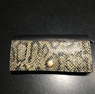 Portemonnee in leder met slangenprint