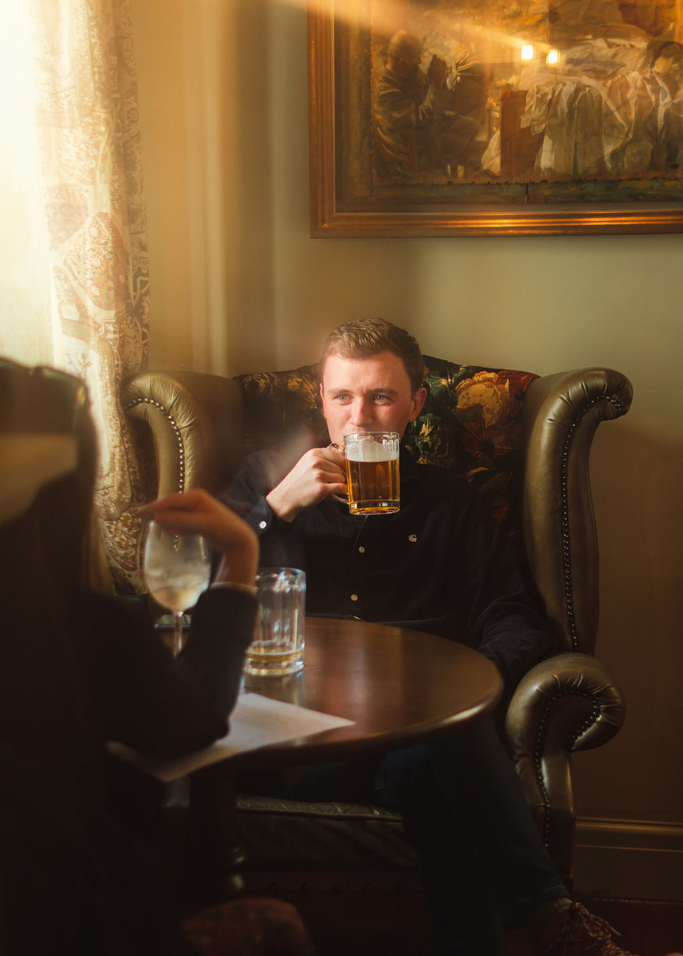 A portrait of a man sitting down , captured during a professional hospitality photography session in Chester by BeyondFra