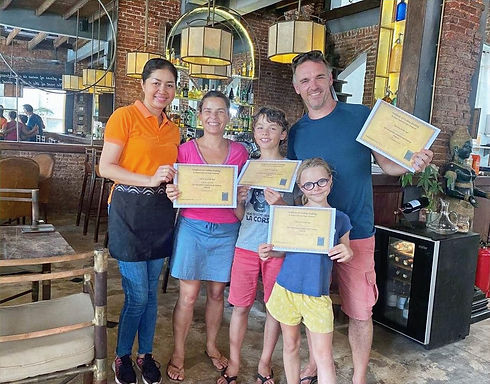 happy family received their certificate of cooking class