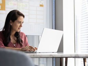 Woman working on laptop