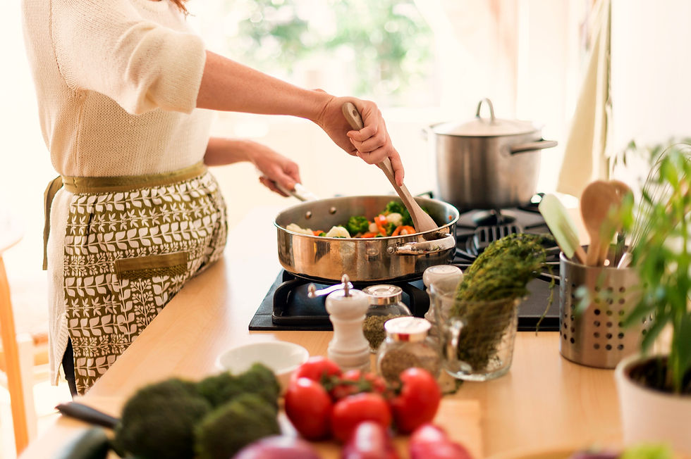 Woman%20Cooking%20in%20Kitchen_edited.jpg