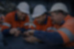 Engineering team reviewing site plans at Rockhampton project