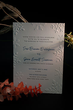 Elegant custom wedding invitation with letterpress and foil stamping in navy and gold