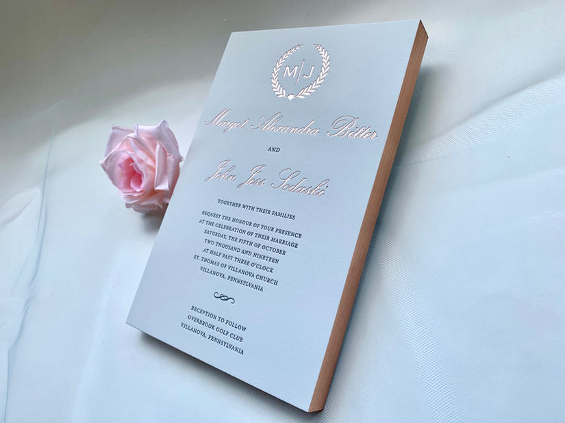 Custom wedding invitation in blush and gold with elegant letterpress