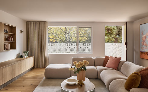 Elegant yet practical living room with low-maintenance materials, versatile neutral palette