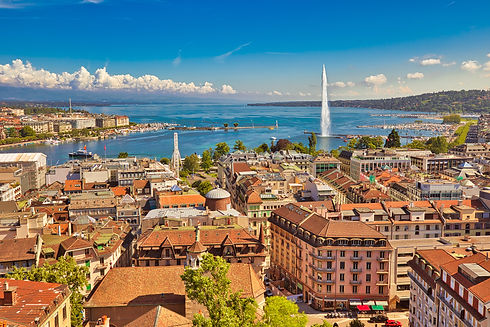 Geneva skyline cityscape, French-Swiss in Switzerland. Aerial view of Jet d'eau fountain,