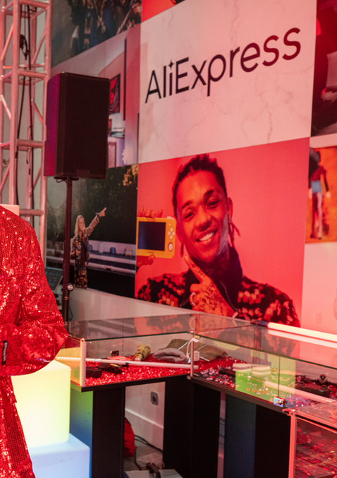 EmCee greets customers at AliExpress Pop-Up