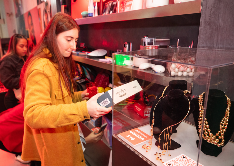 Customer shops a range of products at AliExpress Singles Day Pop-Up
