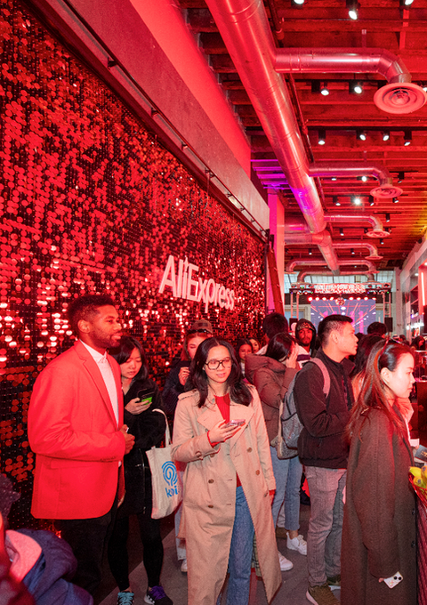 Customers wait in line for AliExpress' 11/11 Coffee & Juice Bar