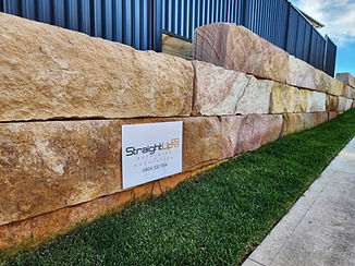 Sandstone log retaining wall