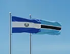 El Salvador and Botswana flags side by side under a clear blue sky, El Salvador e-Tourist visa for Botswana citizens.