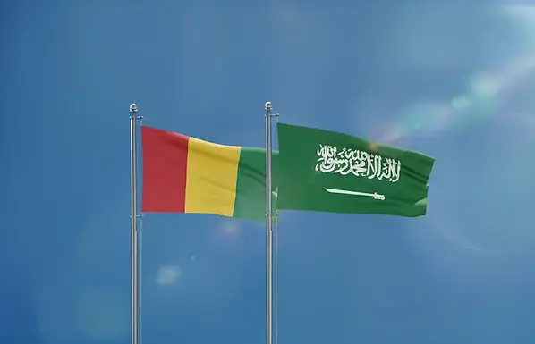 Saudi E-Umrah Visa for Guinea citizens � Guinea and Saudi Arabia flags representing online Saudi visa eligibility for Guineans