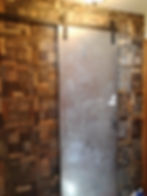 Stainless sliding door and wood wall