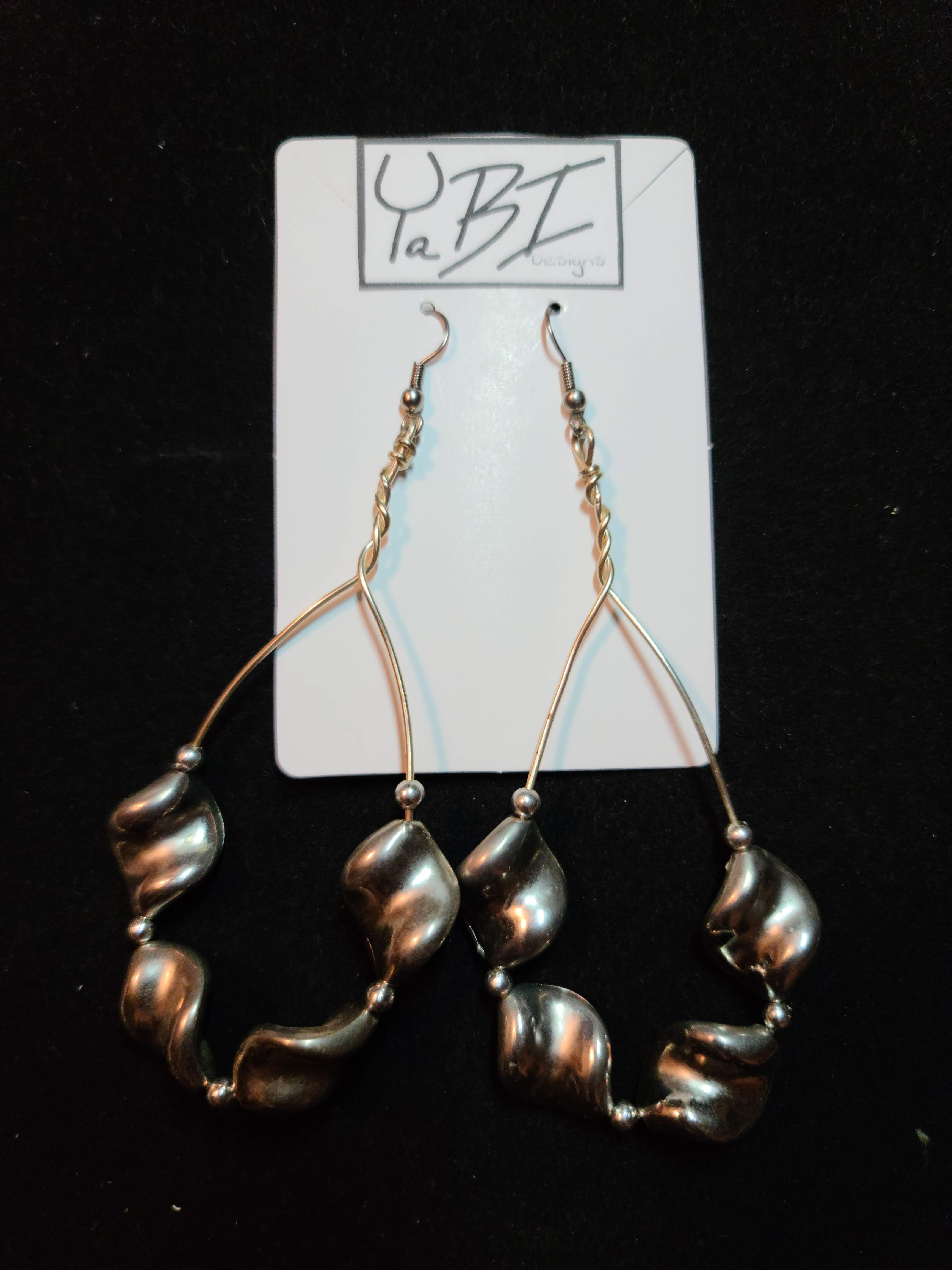 Metal twist hoops