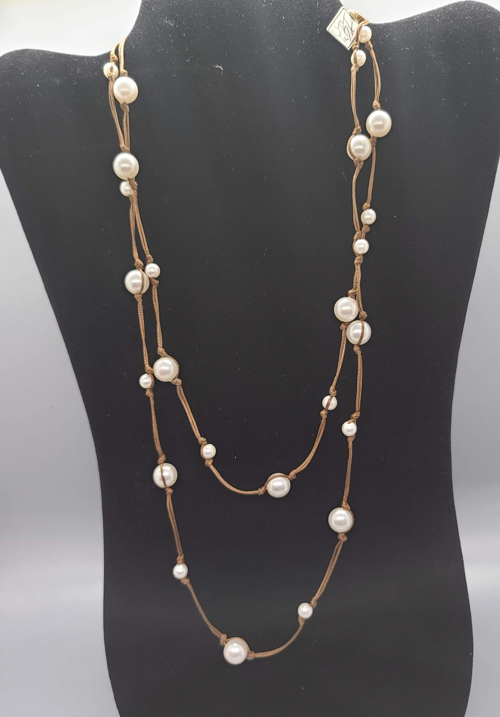 Floating faux pearls