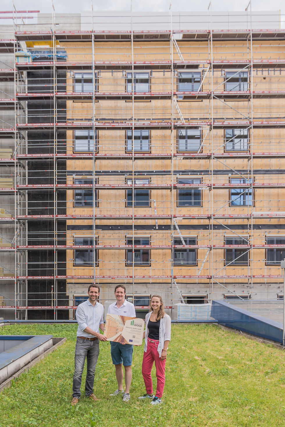 Project partners proHolz Tirol & rtd services in front of the construction site
