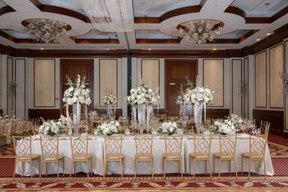 details shot of wedding reception space with white florals 