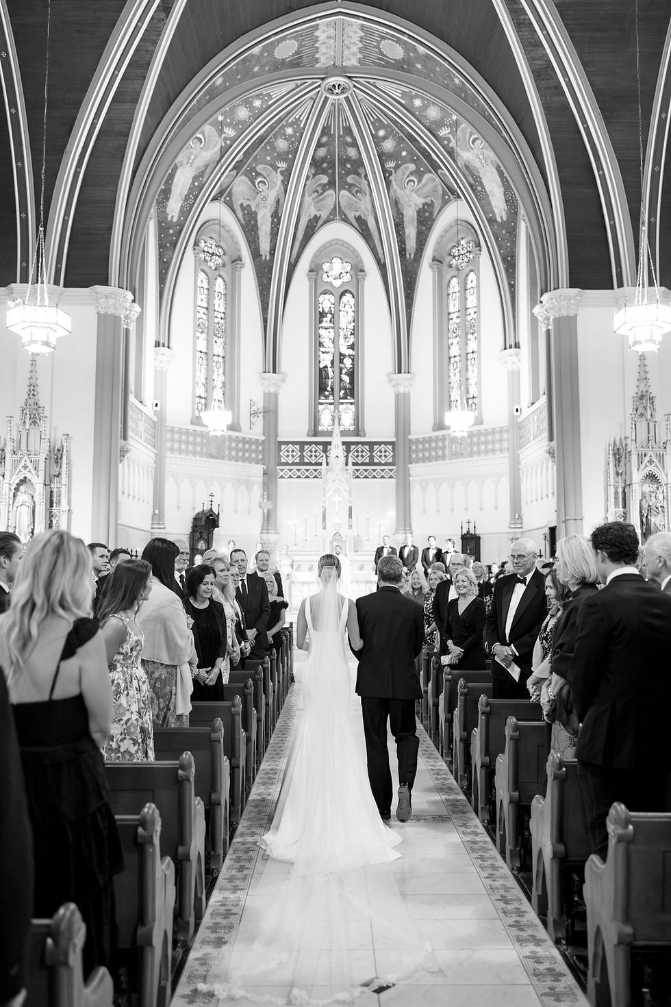 bride walking down aisle with dad