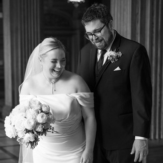 bride and groom laughing
