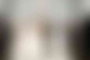 bride and groom holding hands in church during wedding