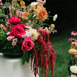 bright pink orange red florals outside wedding Indianapolis