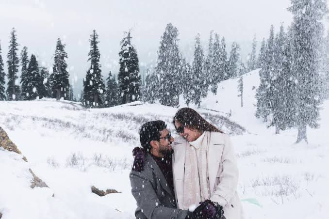 Best time to visit Kashmir for honeymoon in winter — Gulmarg Gondola rising above snow-covered Himalayan peaks