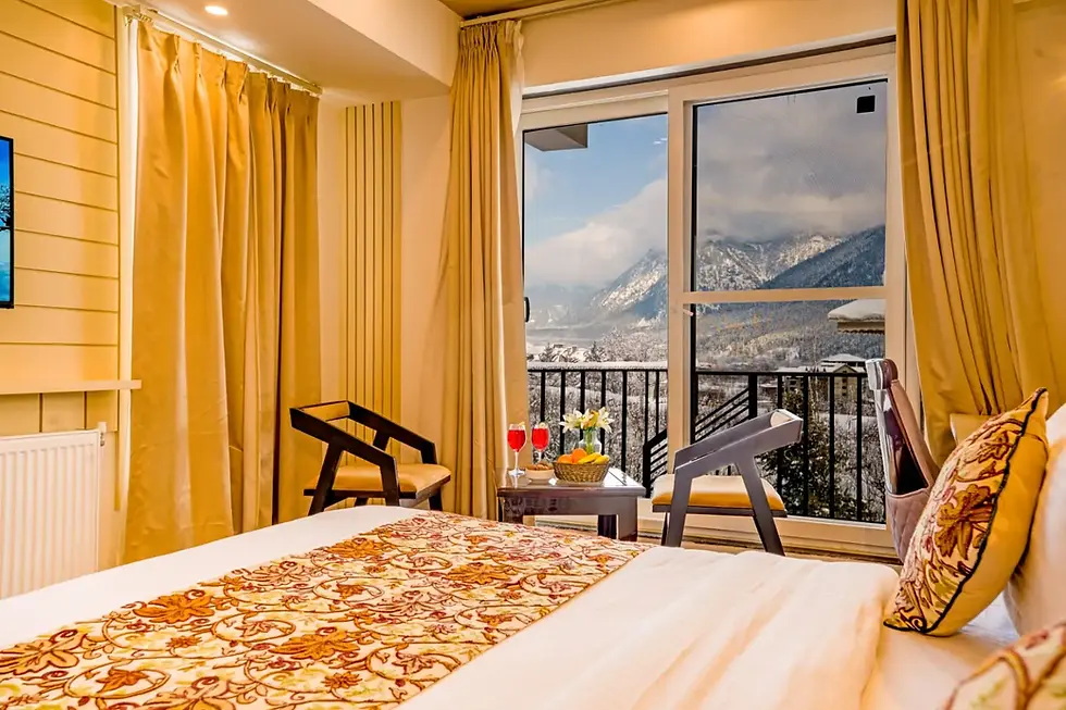 Spacious rooms at an Affordable Luxury Stay in Pahalgam featuring scenic mountain views