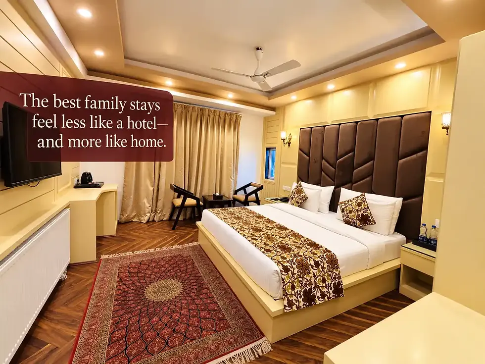 Spacious family room at Hotels in Pahalgam with comfortable bedding, heating and essential facilities